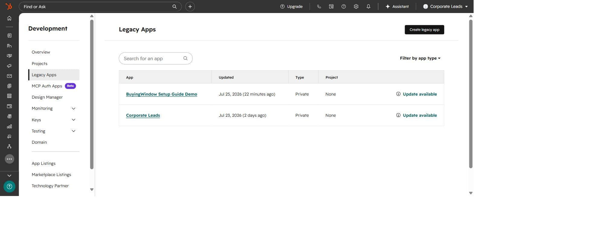 HubSpot Legacy Apps list showing a newly created private app alongside an existing one